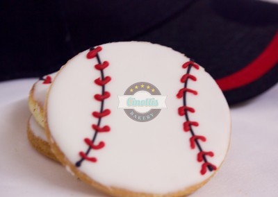 baseball hat cookies, cinottis bakery, cinottis fondant icing cookies