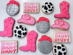 pink and silver disco cowboy birthday cookies