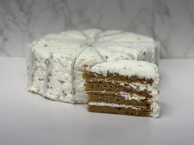 Cinotti's Carrot Cake: Wholesale 4 layers of carrot cake and cream cheese icing. Icing made with pineapples and pecans. 14 Slice